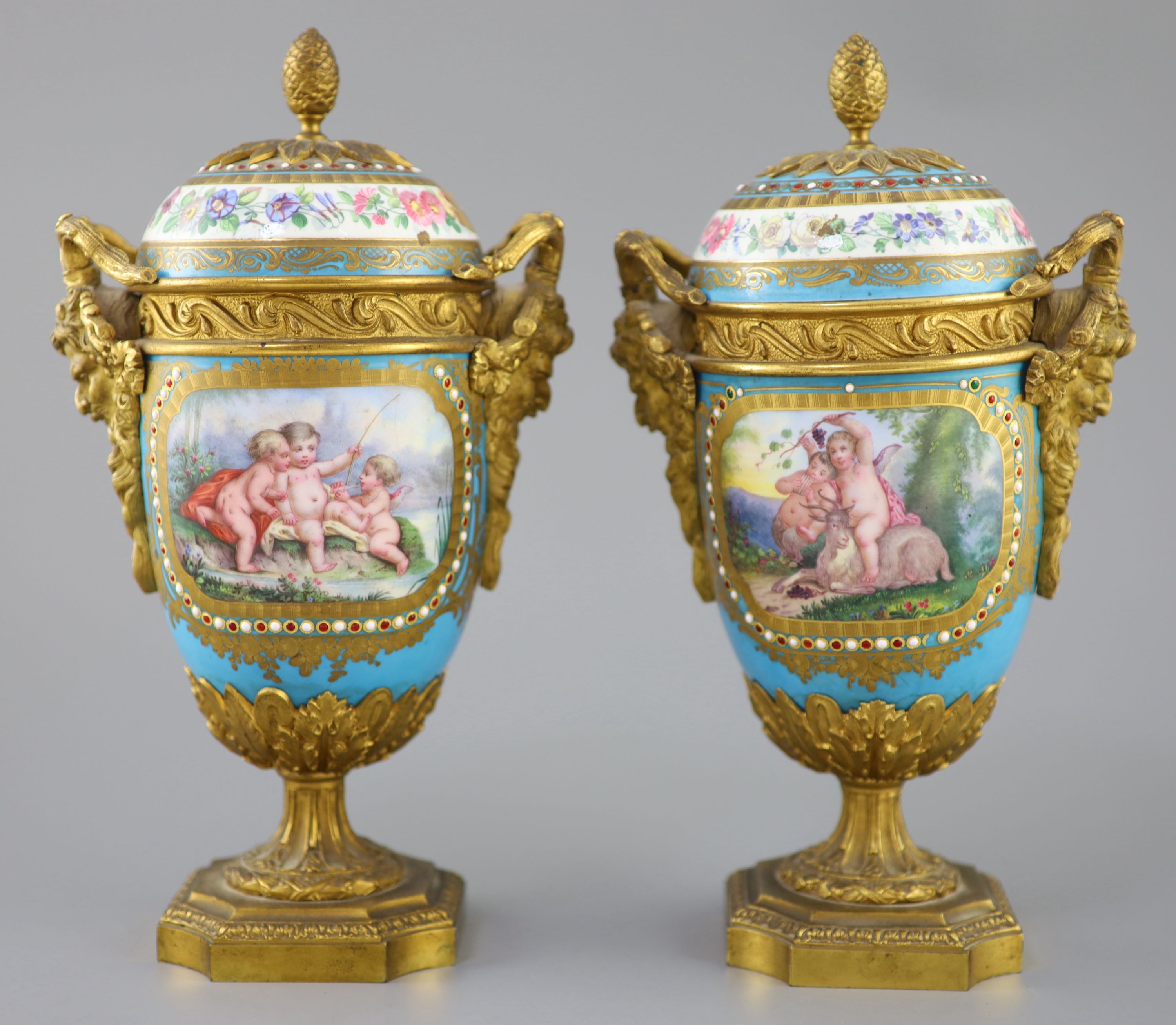 A pair of French Sevres style porcelain and ormolu mounted vases and covers, 19th century, 27cm high